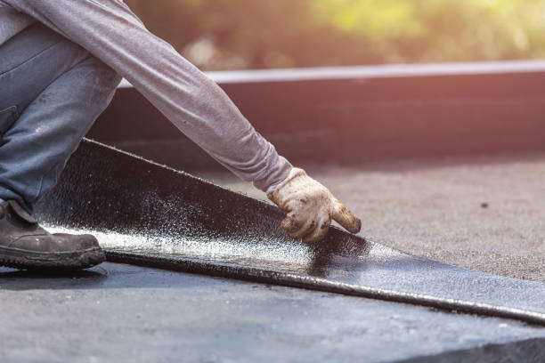 Professional Waterproofing technician working in Riverdale, MI